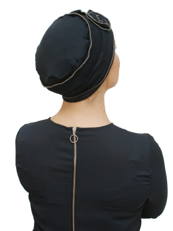 back of women's blue chemo hat
