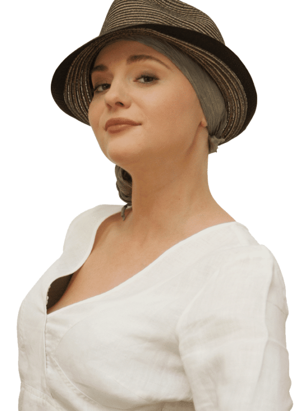 brown trilby hat worn with chemo square head scarf