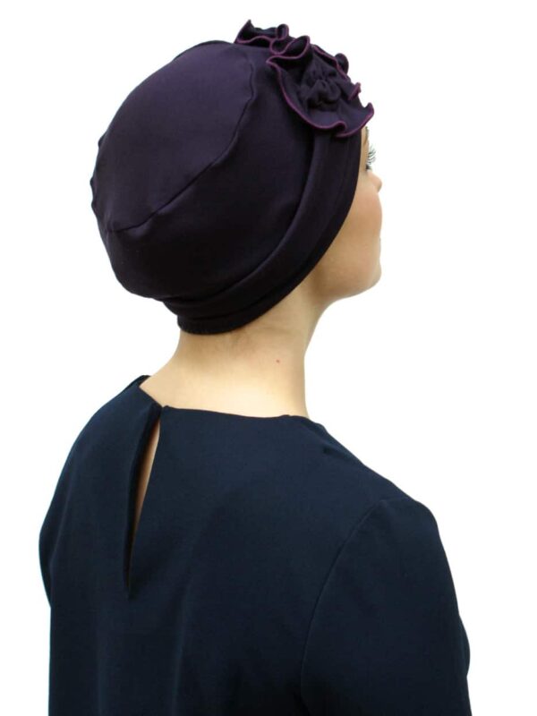 back view of purple chemo hat