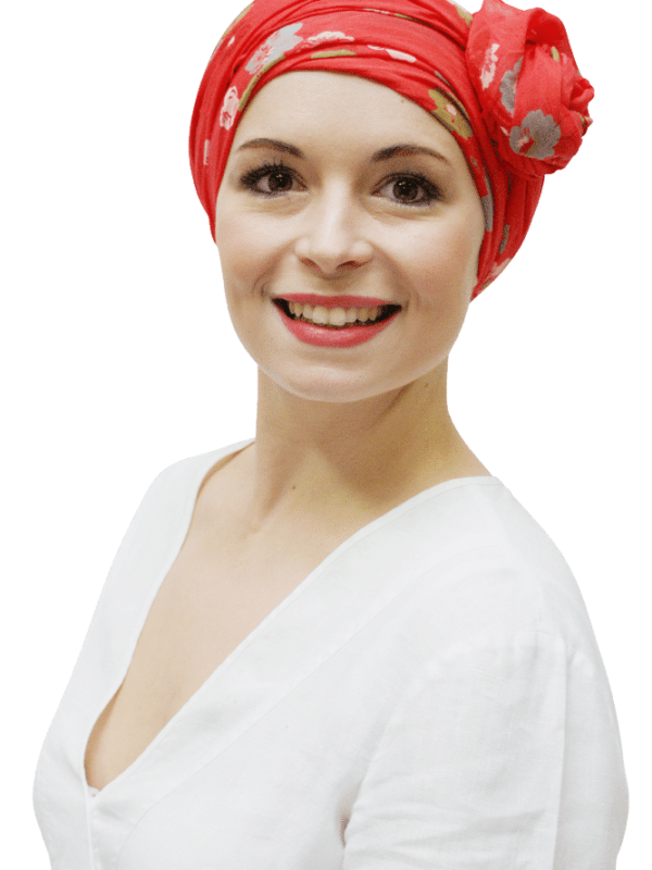 red floral chemo headscarf worn as turban headwrap