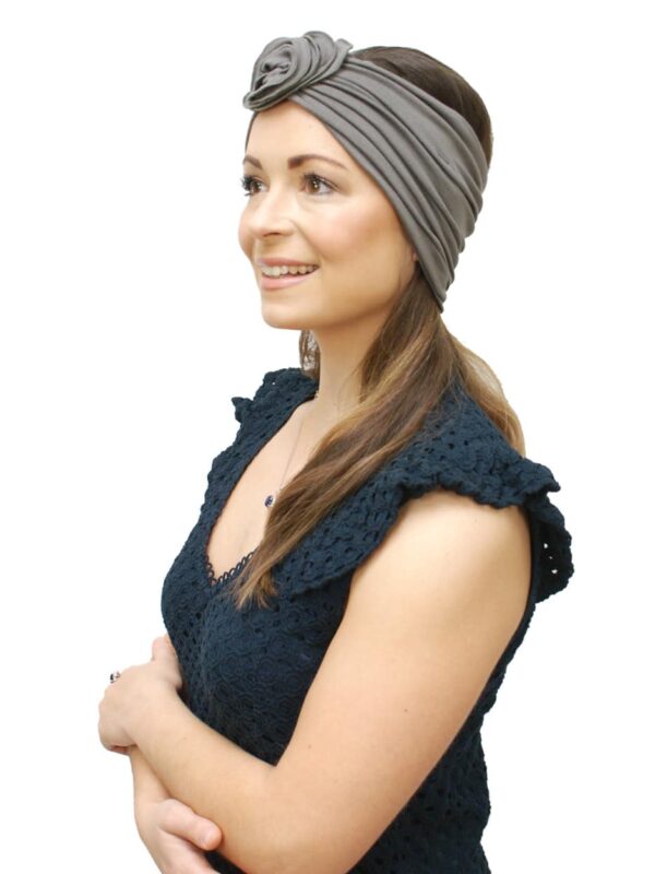 woman with thinning hair wearing wide headband