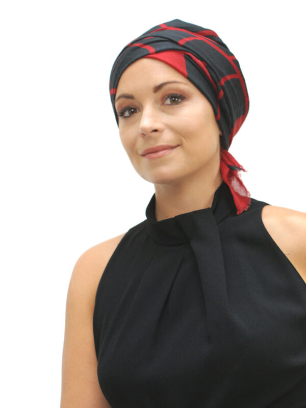 woman wearing red head scarf turban