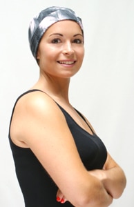 girl wearing chemo sleep hat on her head