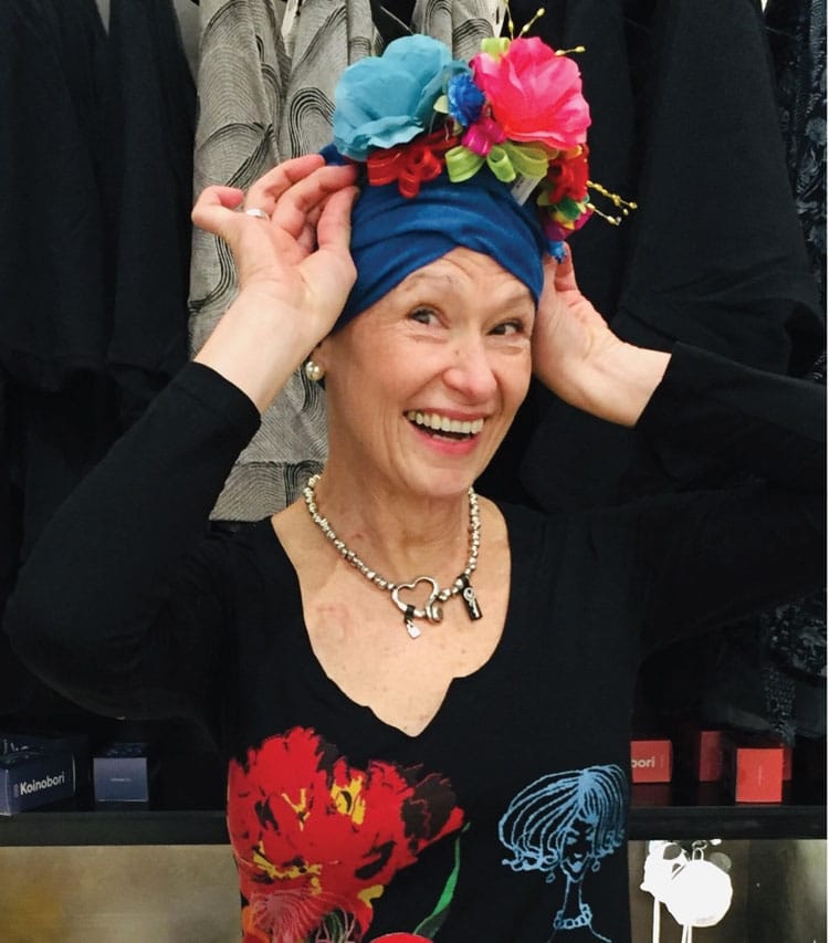 woman wearing chemo hat