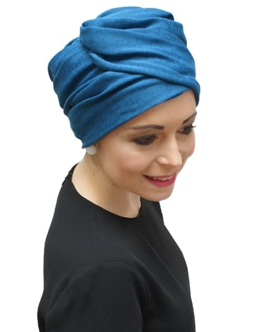 young woman in blue turban