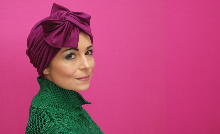 young woman in pink fashion turban