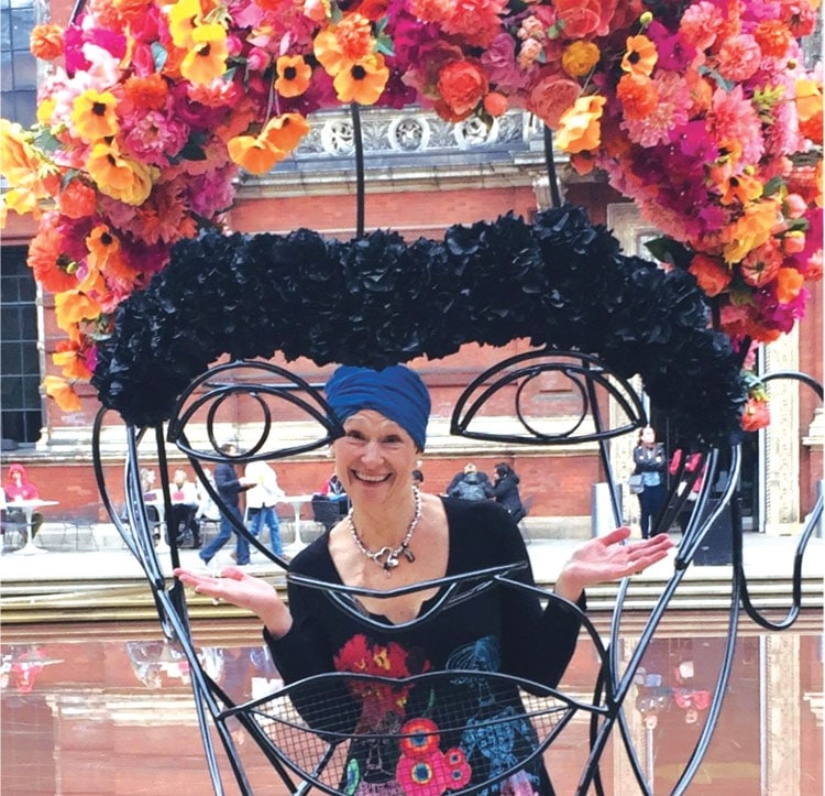 woman wearing chemo turban outside museum