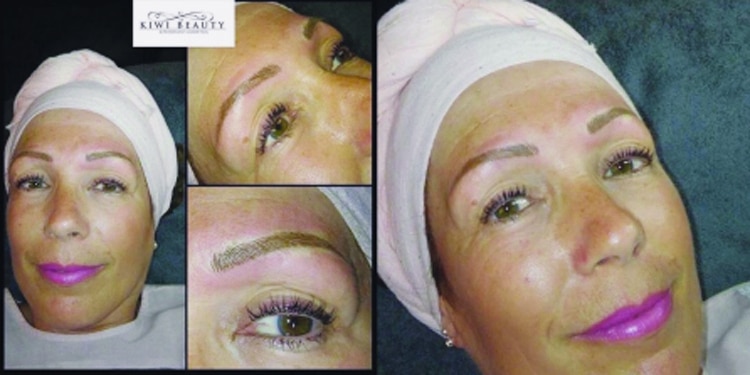 woman having eyebrows drawn by microblading 
