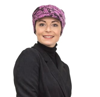 cancer patient wearing chemo cap