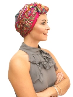 woman wearing pink silk chemo scarf