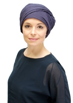 young woman wearing stylish chemo turban