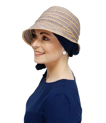 young woman wearing summer chemo hat