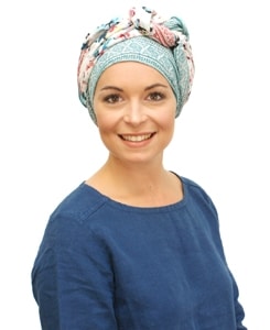 woman wearing floral chemo scarf