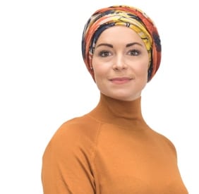 young women wearing winter chemo hat