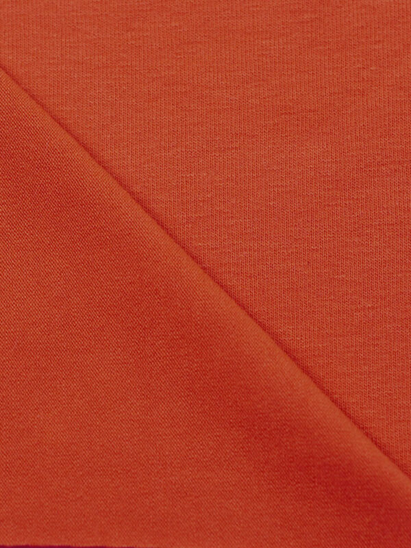 orange fabric swatch close-up