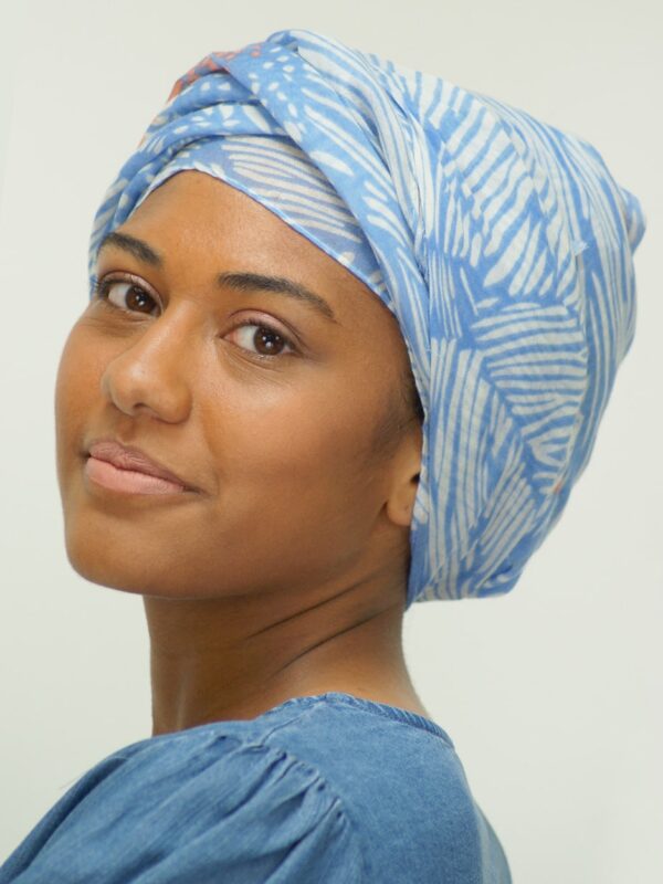 close up of woman wearing scarf turban