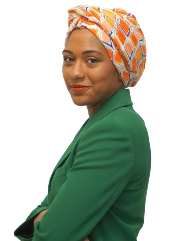 orange headscarf worn to cover hair loss
