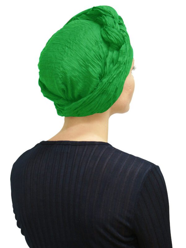 women wearing green head scarf