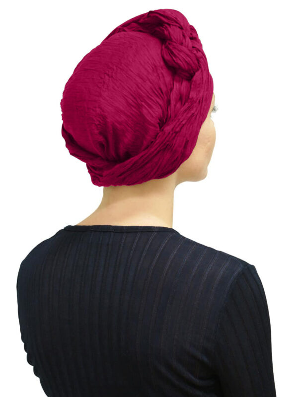 Back view of women wearing raspberry head scarf turban