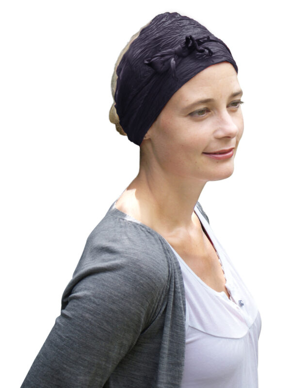 Grey silk headscarf headband worn by woman