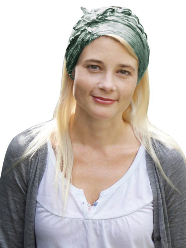 Sage silk head scarf worn by young woman