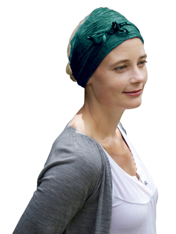 emerald silk headband worn by young woman