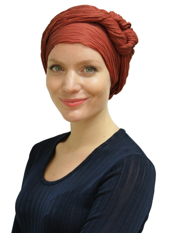 woman wearing brown head scarf turban