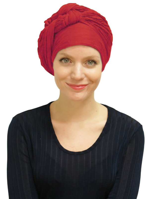 red long turban head scarf worn by woman