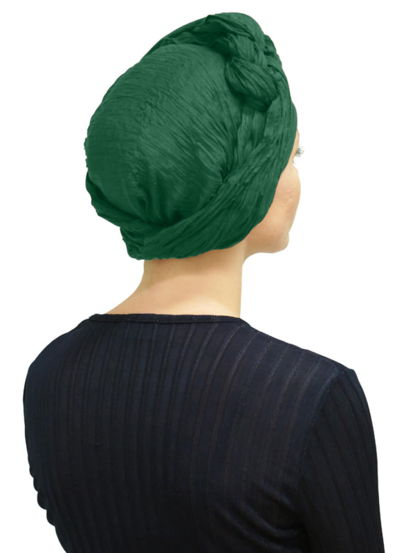 Back view of women wearing emerald green head scarf turban