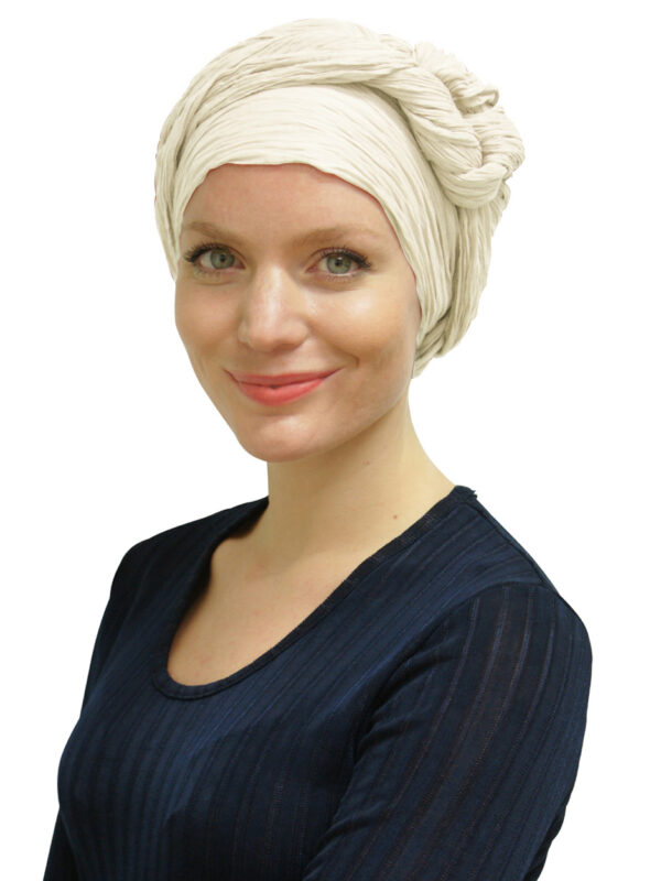 women wearing cream head scarf as a turban