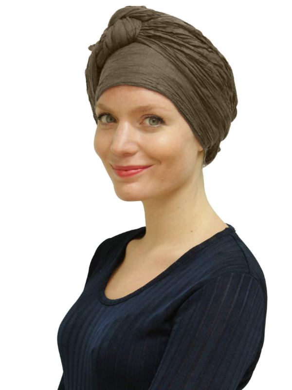 Woman wearing coffee head scarf turban