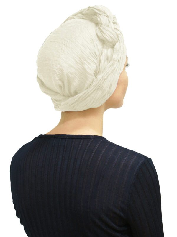 Back view of women wearing head scarf turban