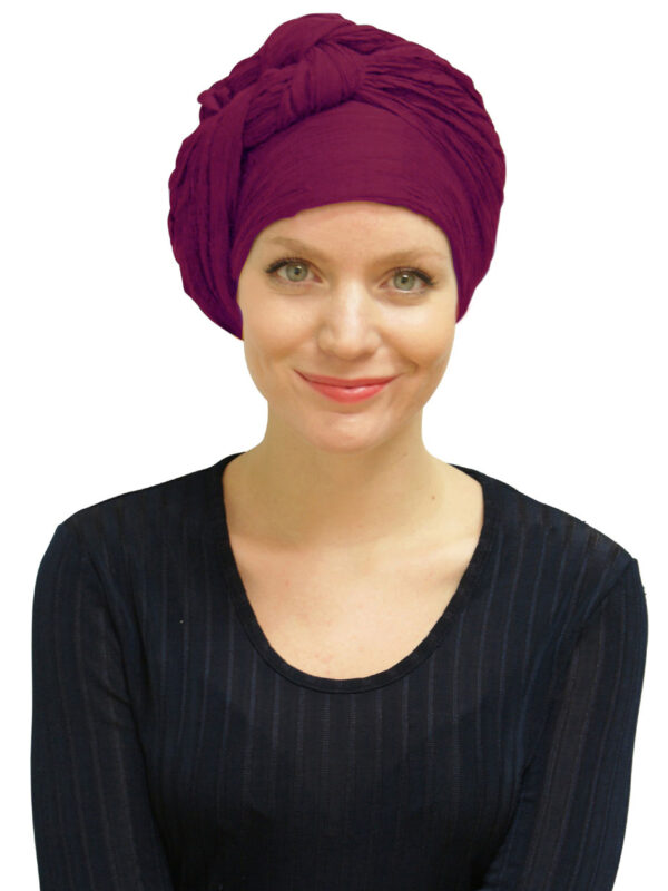 woman wearing red scarf as turban