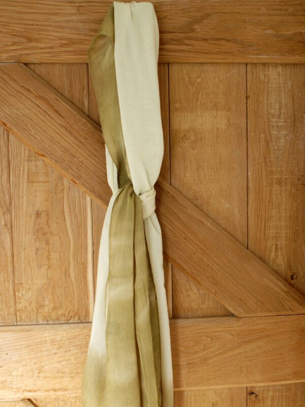 long gold chemo scarf hanging on door peg
